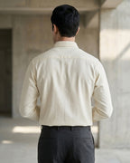 Lifestyle image of man wearing buttercream yelllow premium cotton regular fit shirt by Ekrangi