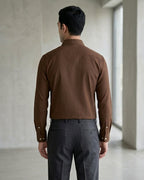 Lifestyle image of man wearing cocoa brown premium polyester cotton regular fit shirt by Ekrangi