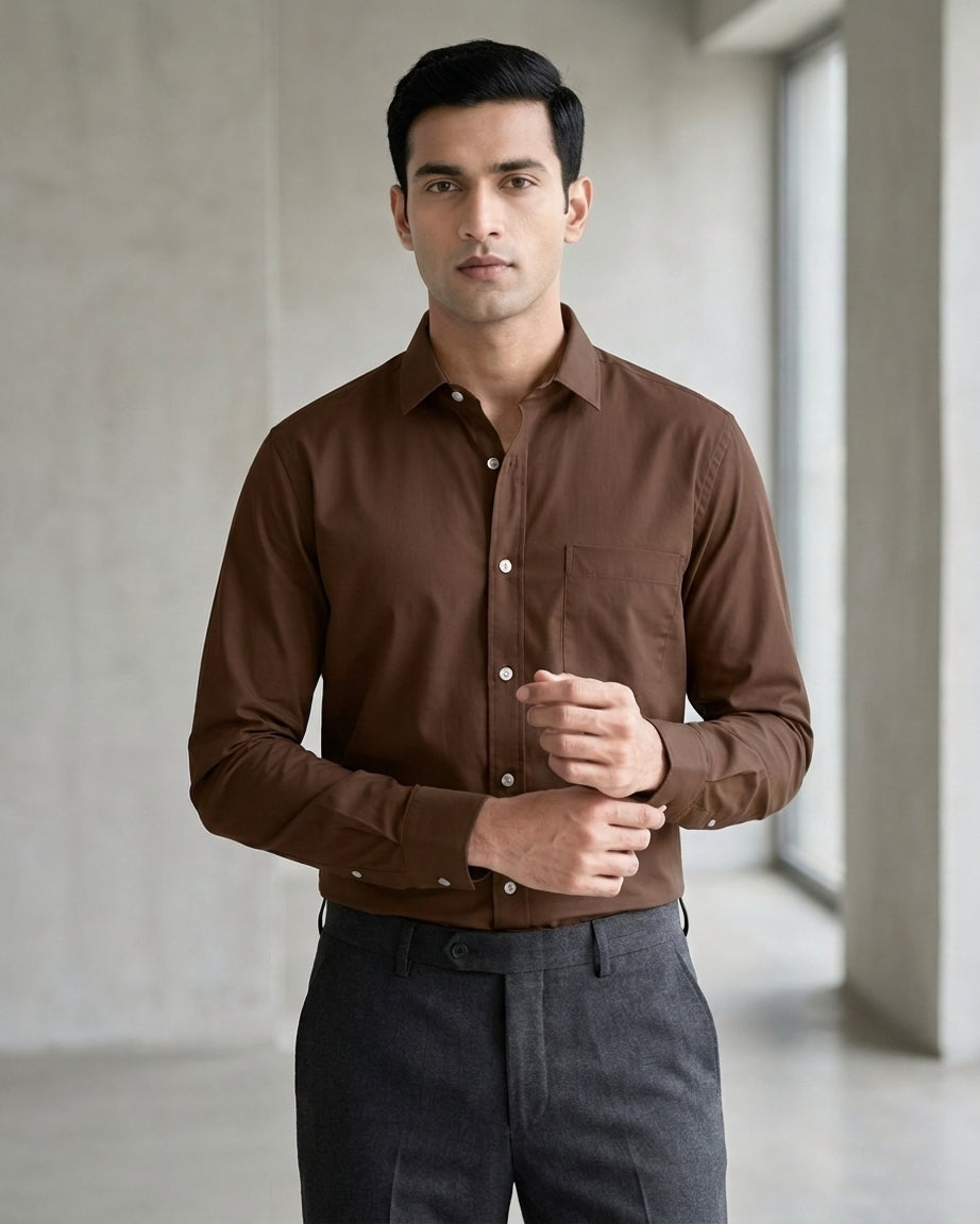 Lifestyle image of man wearing cocoa brown premium polyester cotton regular fit shirt by Ekrangi