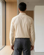 Lifestyle image of man wearing dawn orange premium cotton regular fit shirt by Ekrangi