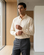 Lifestyle image of man wearing dawn orange premium cotton regular fit shirt by Ekrangi
