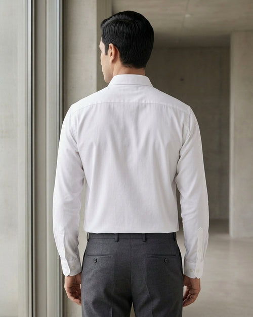 Lifestyle image of man wearing dawn yellow premium polyester cotton regular fit shirt by Ekrangi
