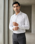 Lifestyle image of man wearing dawn yellow premium polyester cotton regular fit shirt by Ekrangi