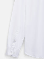 Close-up of fabric of men’s ivory white premium polyester cotton shirt by Ekrangi