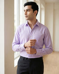 Lifestyle image of man wearing lilac lavender premium cotton regular fit shirt by Ekrangi