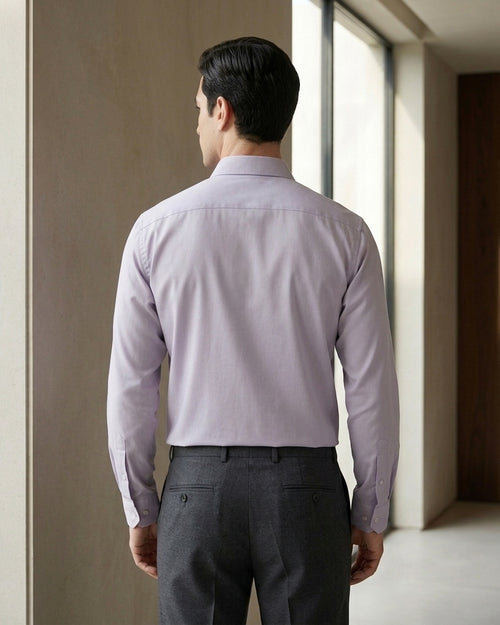 Lifestyle image of man wearing mauve purple premium polyester cotton regular fit shirt by Ekrangi