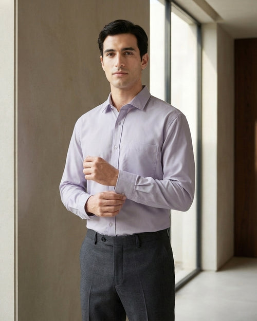 Lifestyle image of man wearing mauve purple premium polyester cotton regular fit shirt by Ekrangi
