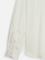 Close-up of fabric of men’s metro white premium cotton shirt by Ekrangi