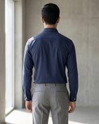 Lifestyle image of man wearing midnight blue premium cotton regular fit shirt by Ekrangi