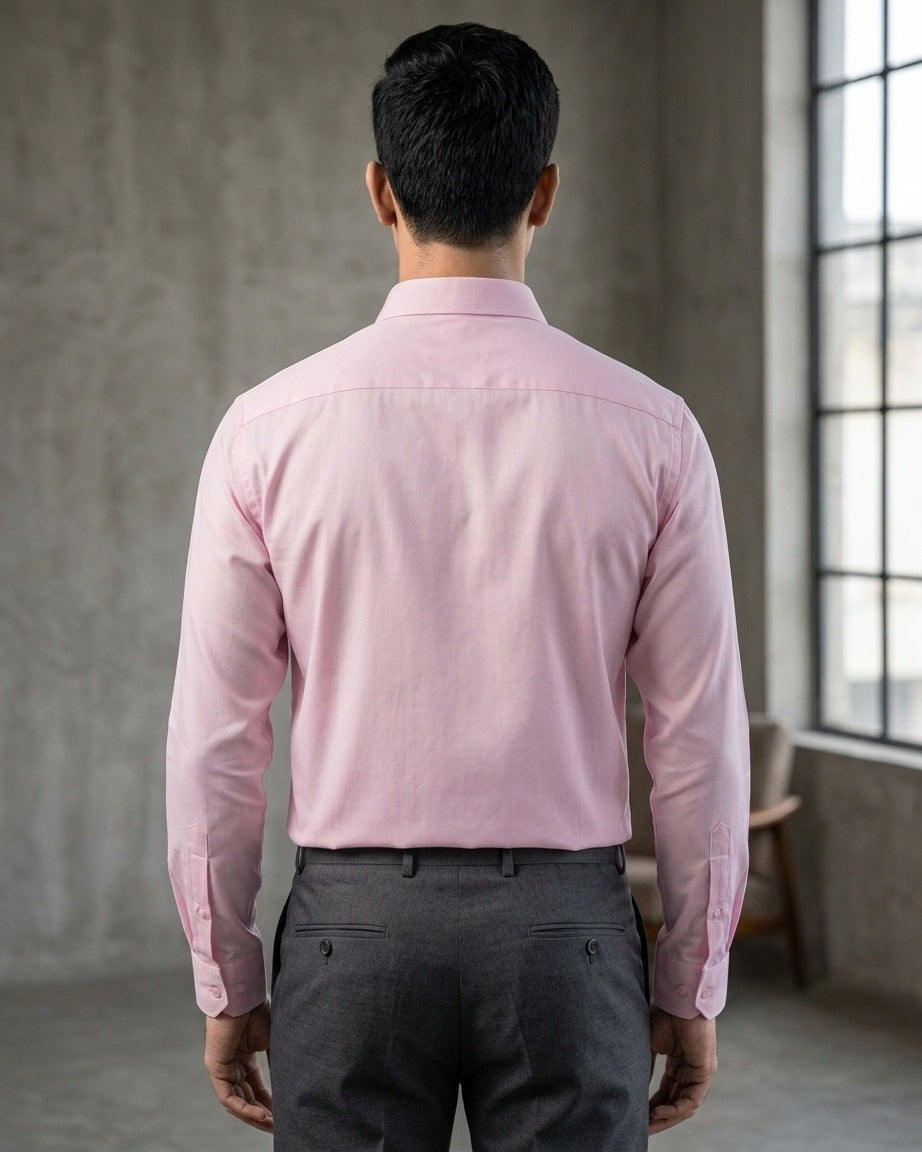 Lifestyle image of man wearing rose quartz pink cotton sateen regular fit shirt by Ekrangi