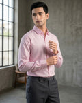 Lifestyle image of man wearing rose quartz pink cotton sateen regular fit shirt by Ekrangi