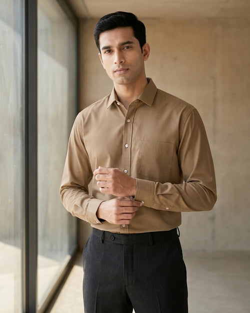Lifestyle image of man wearing taupe brown premium polyester cotton regular fit shirt by Ekrangi