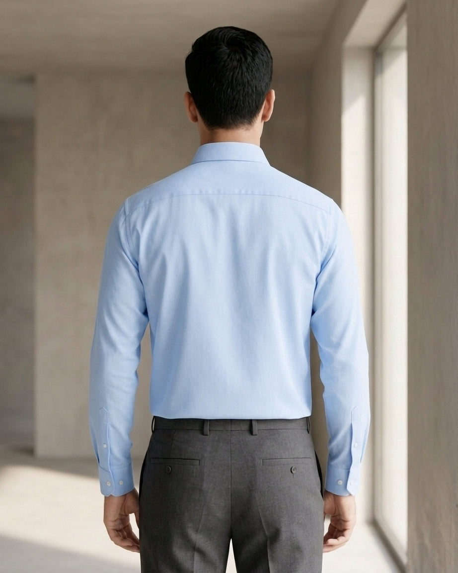 Lifestyle image of man wearing tranquil blue premium cotton regular fit shirt by Ekrangi
