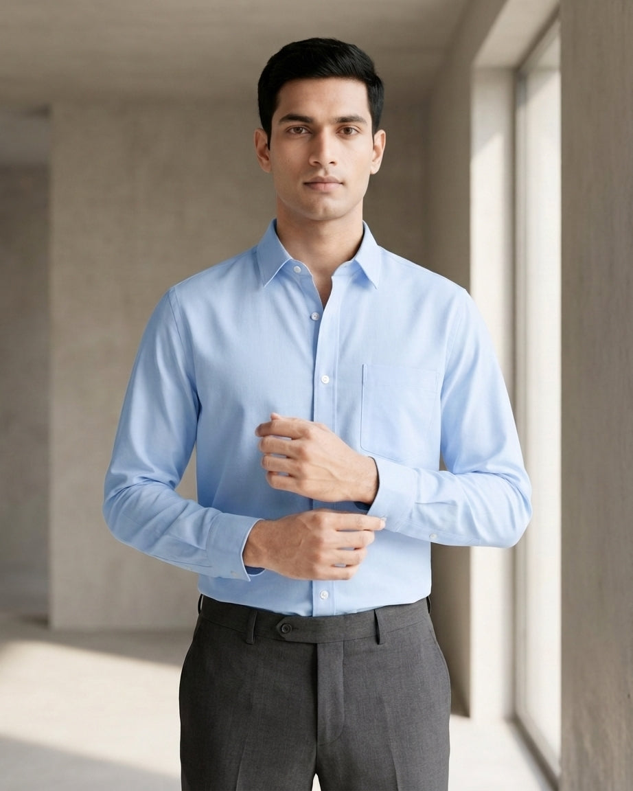 Lifestyle image of man wearing tranquil blue premium cotton regular fit shirt by Ekrangi